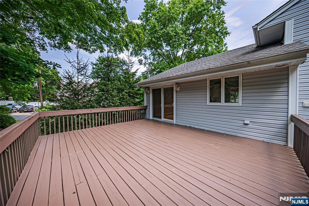 71 Columbus Road Demarest, NJ 07627 - Photo 17 of 50 a view of deck with wooden floor and fence