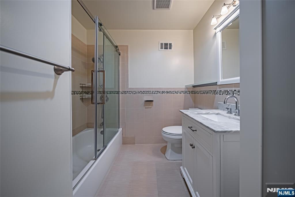 71 Columbus Road Demarest, NJ 07627 - Photo 34 of 50 a bathroom with a sink toilet and shower