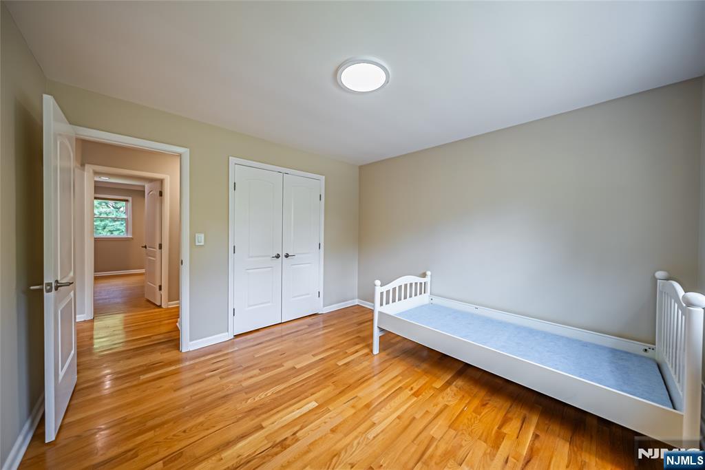 71 Columbus Road Demarest, NJ 07627 - Photo 35 of 50 a view of empty room with wooden floor