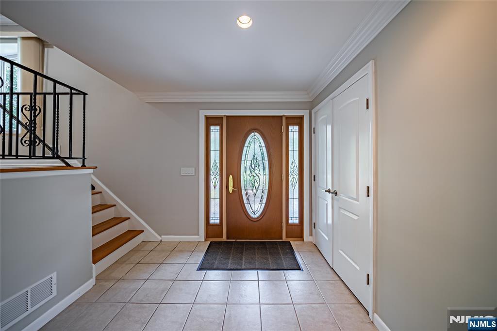 71 Columbus Road Demarest, NJ 07627 - Photo 4 of 50 a view of front door with stairs