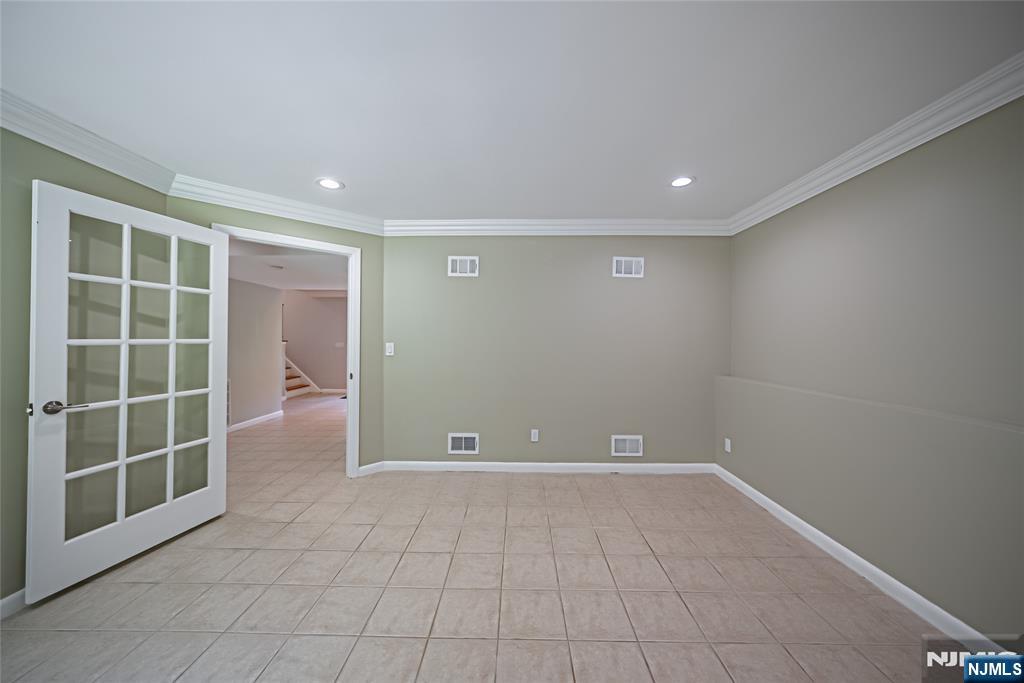 71 Columbus Road Demarest, NJ 07627 - Photo 44 of 50 a view of an empty room with a window