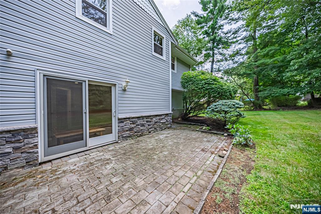 71 Columbus Road Demarest, NJ 07627 - Photo 47 of 50 a view of a house with a yard