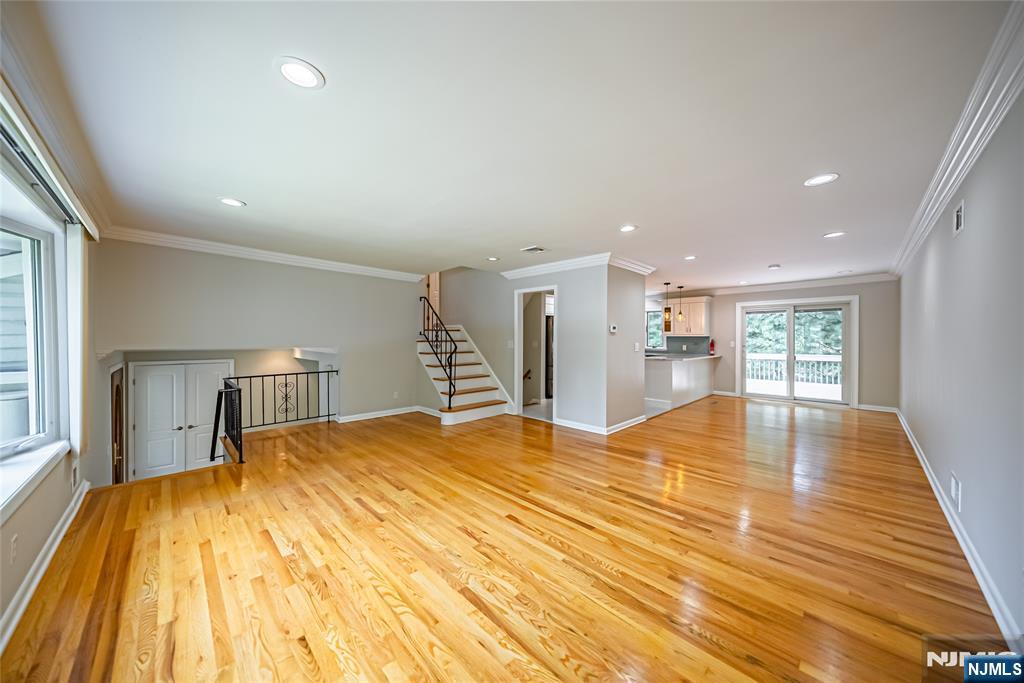 71 Columbus Road Demarest, NJ 07627 - Photo 7 of 50 a big room with wooden floor and pool table