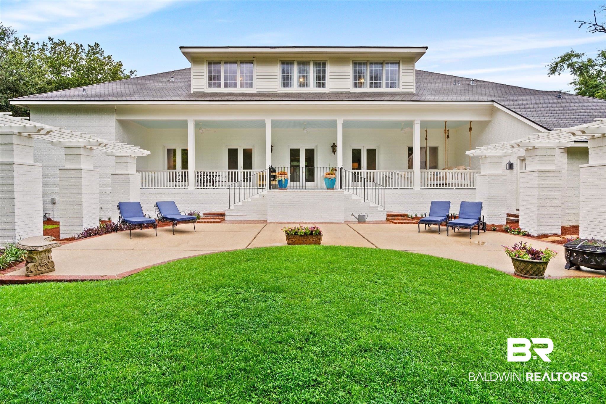 6458 Raintree Road Fairhope, AL 36532 - Photo 41 of 65 Back of house with a lawn and a patio area