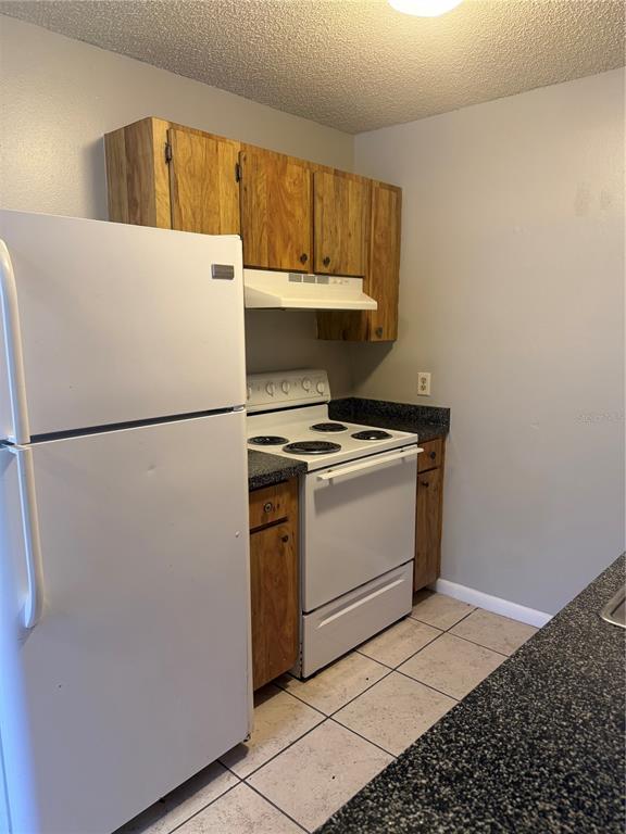 3020 Allred Drive, Unit C Auburndale, FL 33823 - Photo 3 of 6 a utility room with washer and dryer