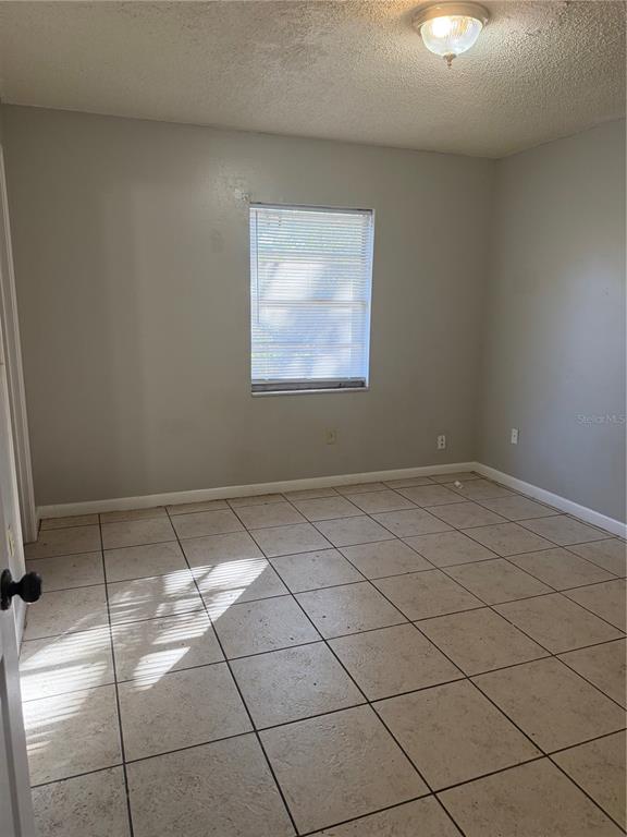 3020 Allred Drive, Unit C Auburndale, FL 33823 - Photo 5 of 6 a view of room and window
