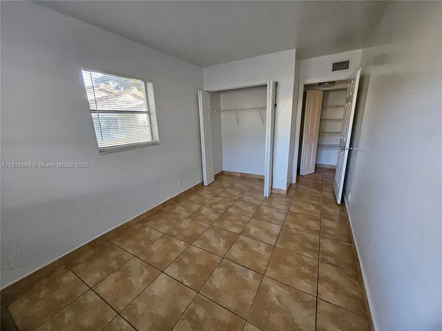 a view of entryway with stairs