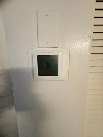 a bathroom with a toilet and a bath tub