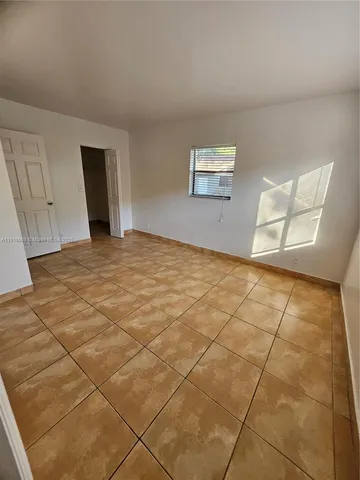 a view of a room with an empty space