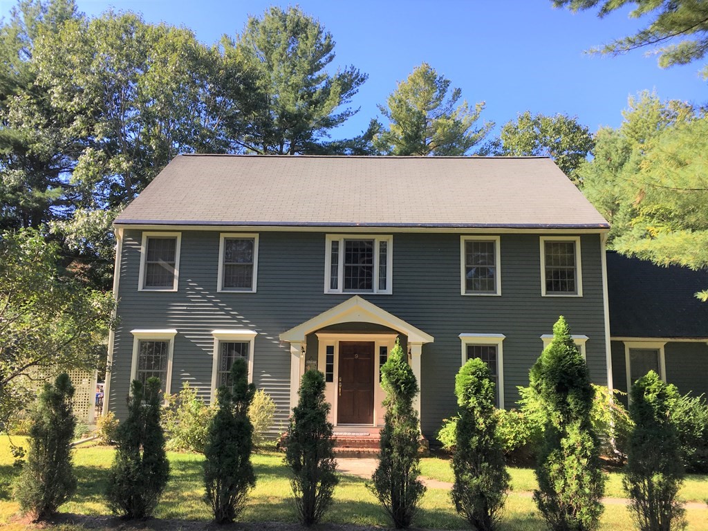 9 Virginia Ridge Road Sudbury, MA 01776 - Photo 1 of 40 a front view of a house with a garden