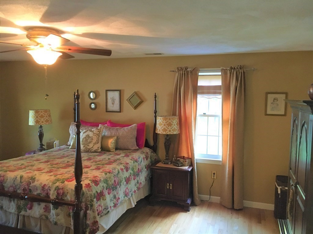 9 Virginia Ridge Road Sudbury, MA 01776 - Photo 21 of 40 a bedroom with a bed and a window