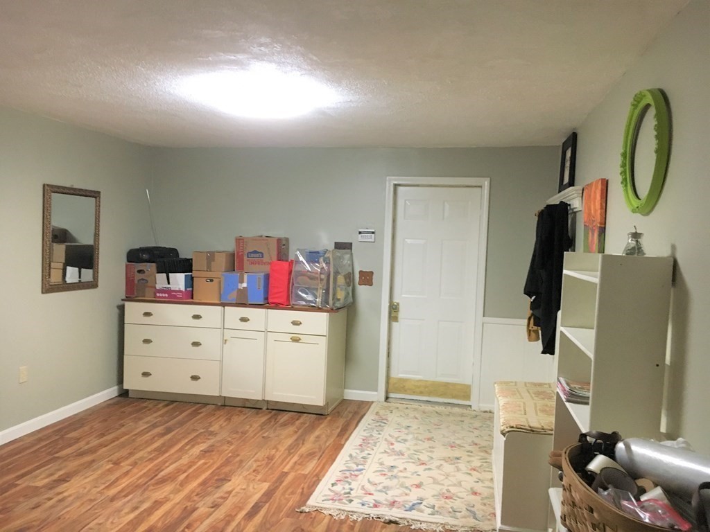 9 Virginia Ridge Road Sudbury, MA 01776 - Photo 36 of 40 a bed room with a bed and a television
