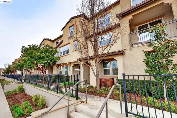 a view of a building with a iron gate