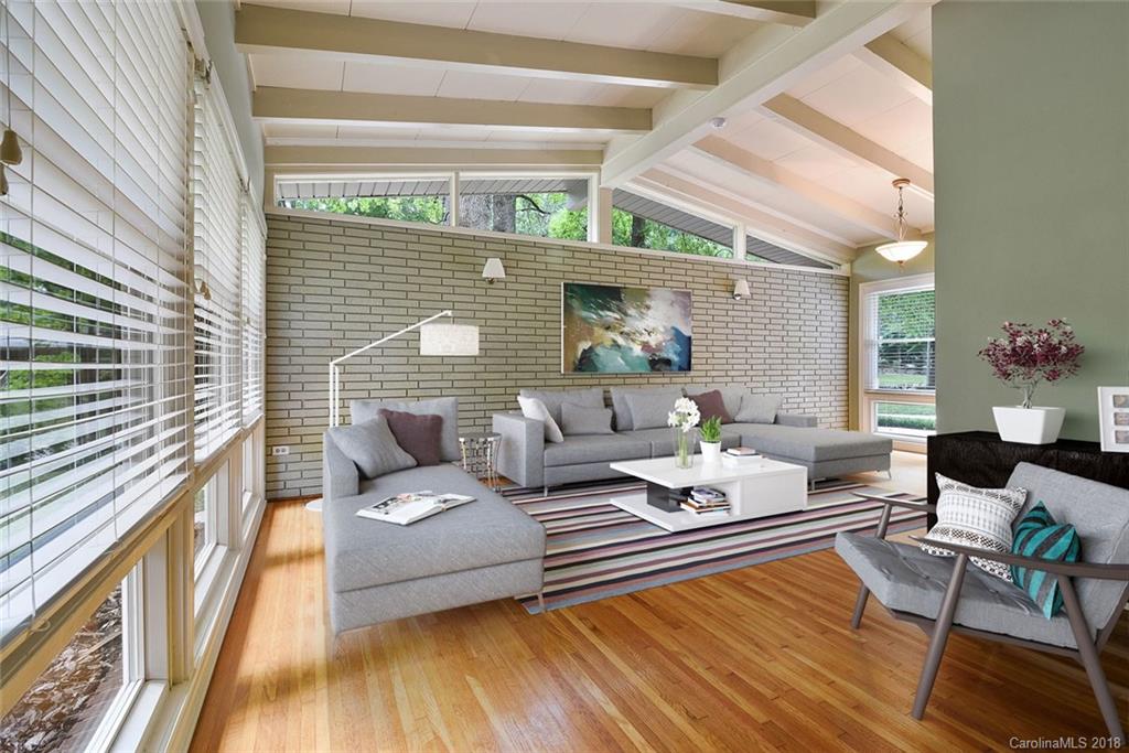 5523 Seacroft Road Charlotte, NC 28210 - Photo 2 of 15 a living room with furniture and wooden floor