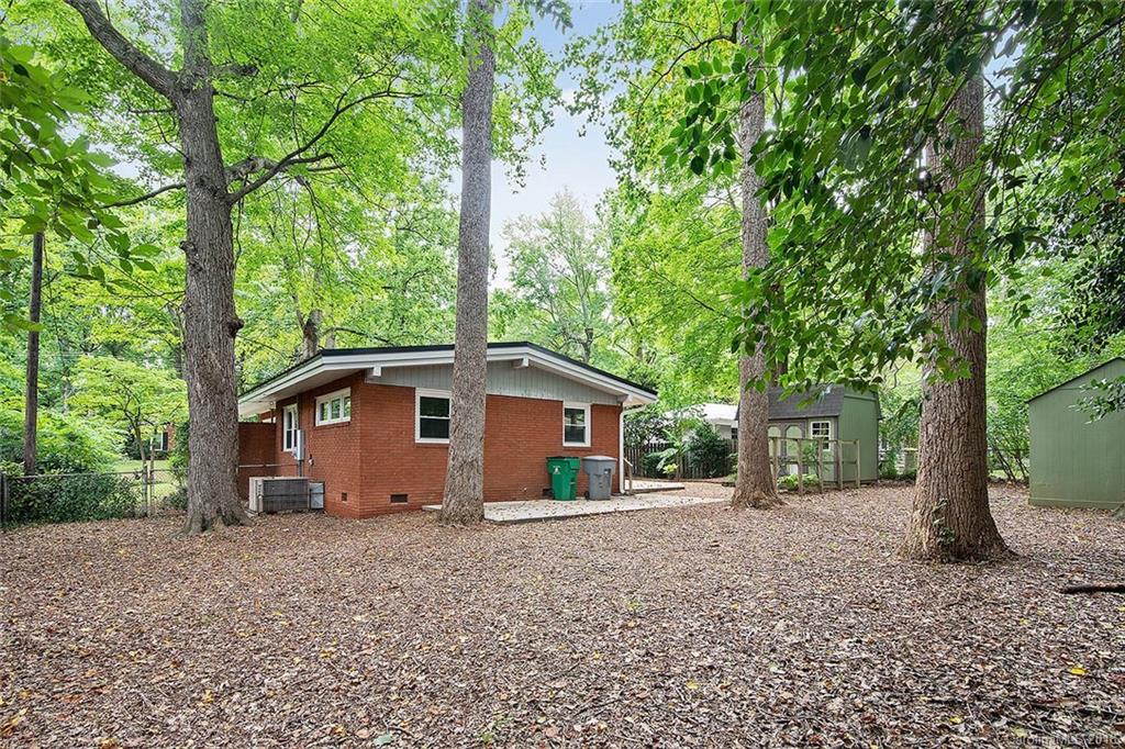 5523 Seacroft Road Charlotte, NC 28210 - Photo 15 of 15 a view of a house with a yard and tree