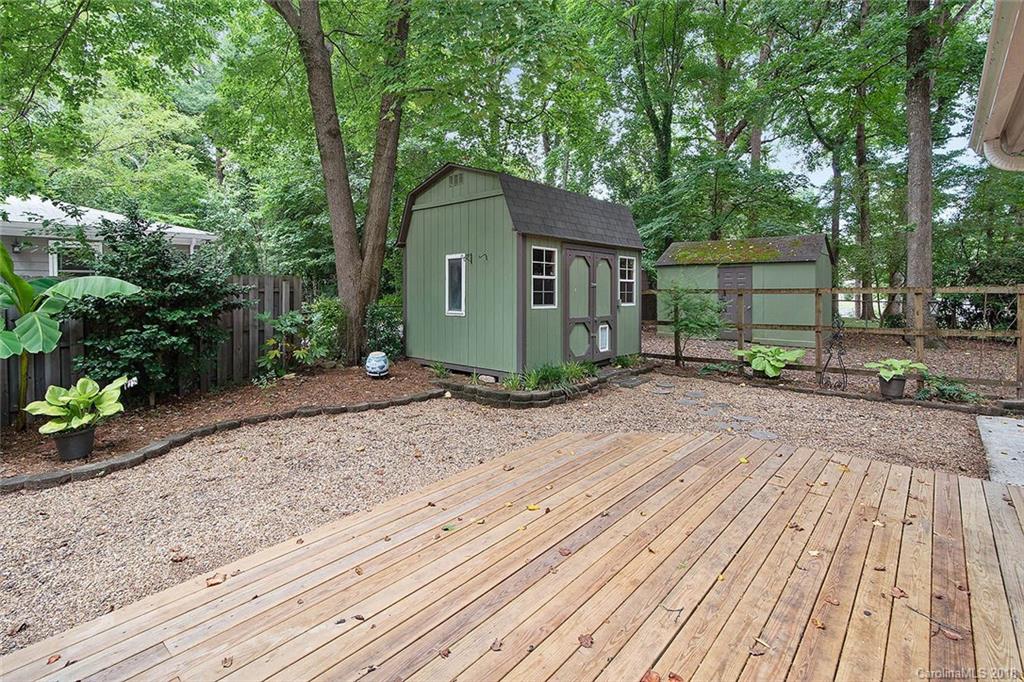 5523 Seacroft Road Charlotte, NC 28210 - Photo 4 of 15 a front view of a house with a yard