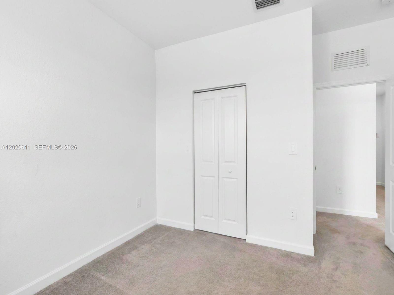 26455 Southwest 148th Avenue Homestead, FL 33032 - Photo 19 of 35 a view of an empty room