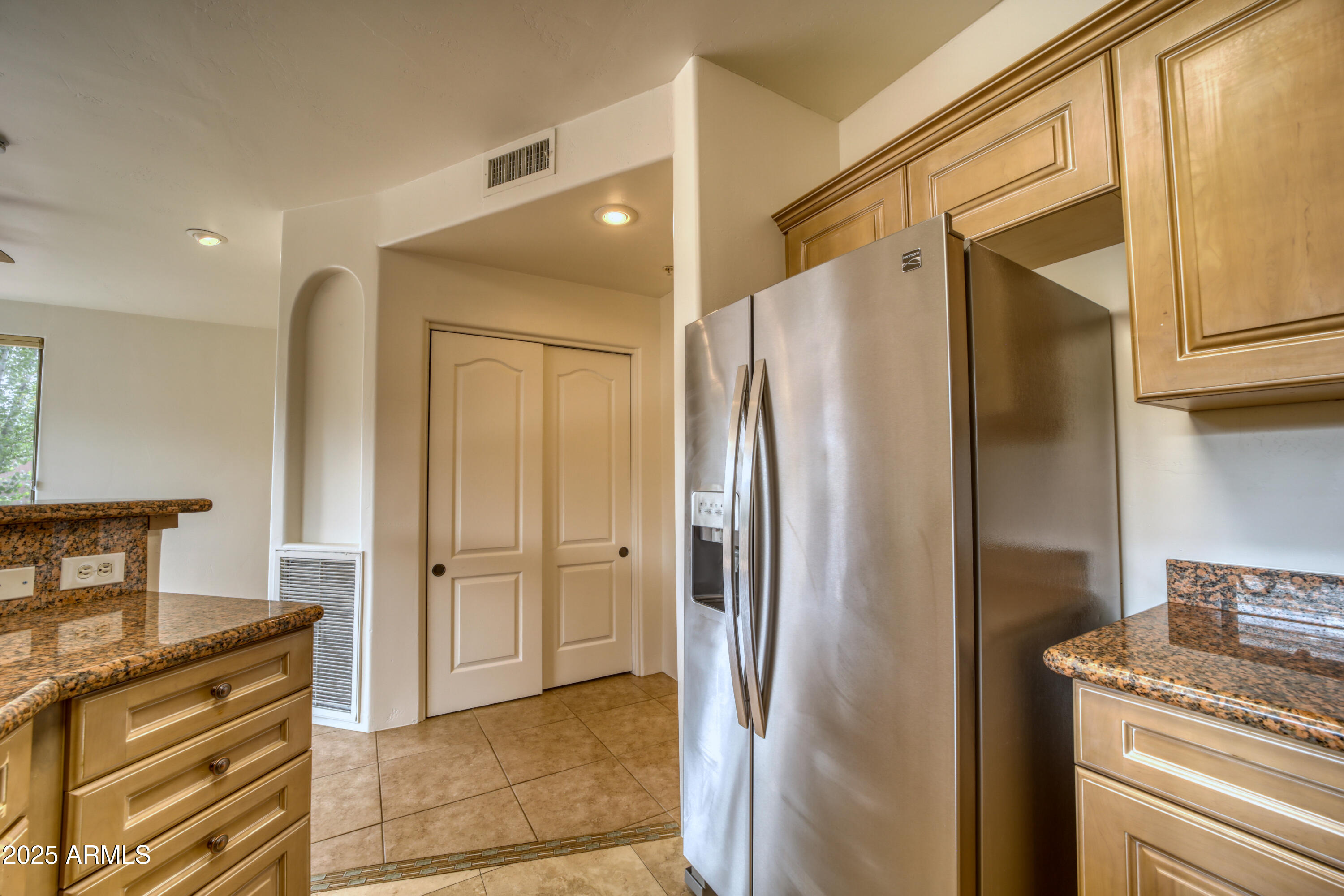 520 Jordan Road, Unit 4 Sedona, AZ 86336 - Photo 12 of 29 a kitchen with a refrigerator and a stove