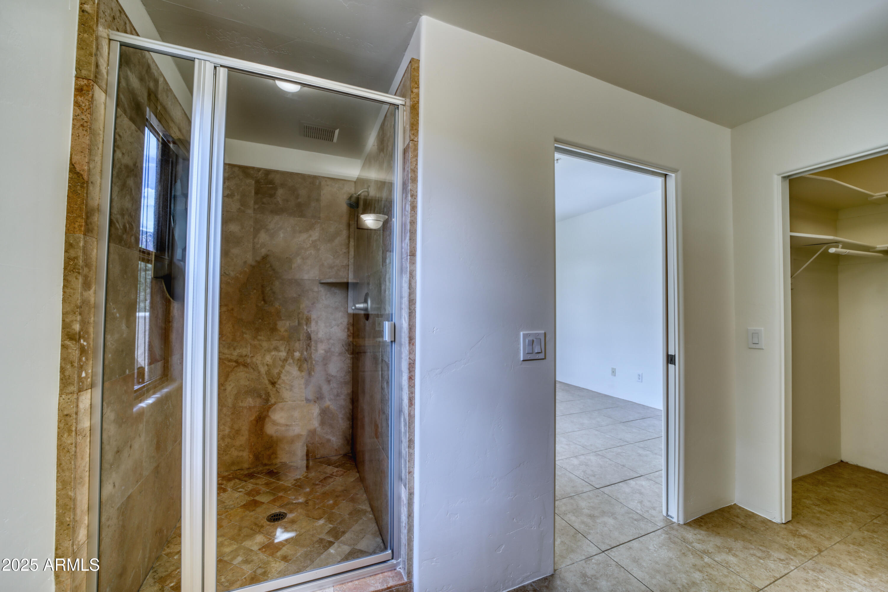 520 Jordan Road, Unit 4 Sedona, AZ 86336 - Photo 17 of 29 a bathroom with a glass shower door