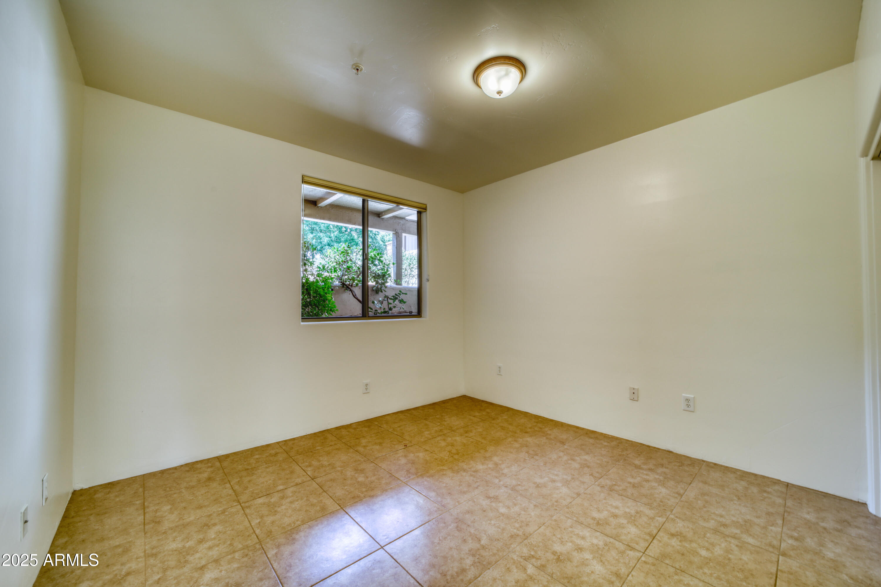 520 Jordan Road, Unit 4 Sedona, AZ 86336 - Photo 21 of 29 an empty room with windows