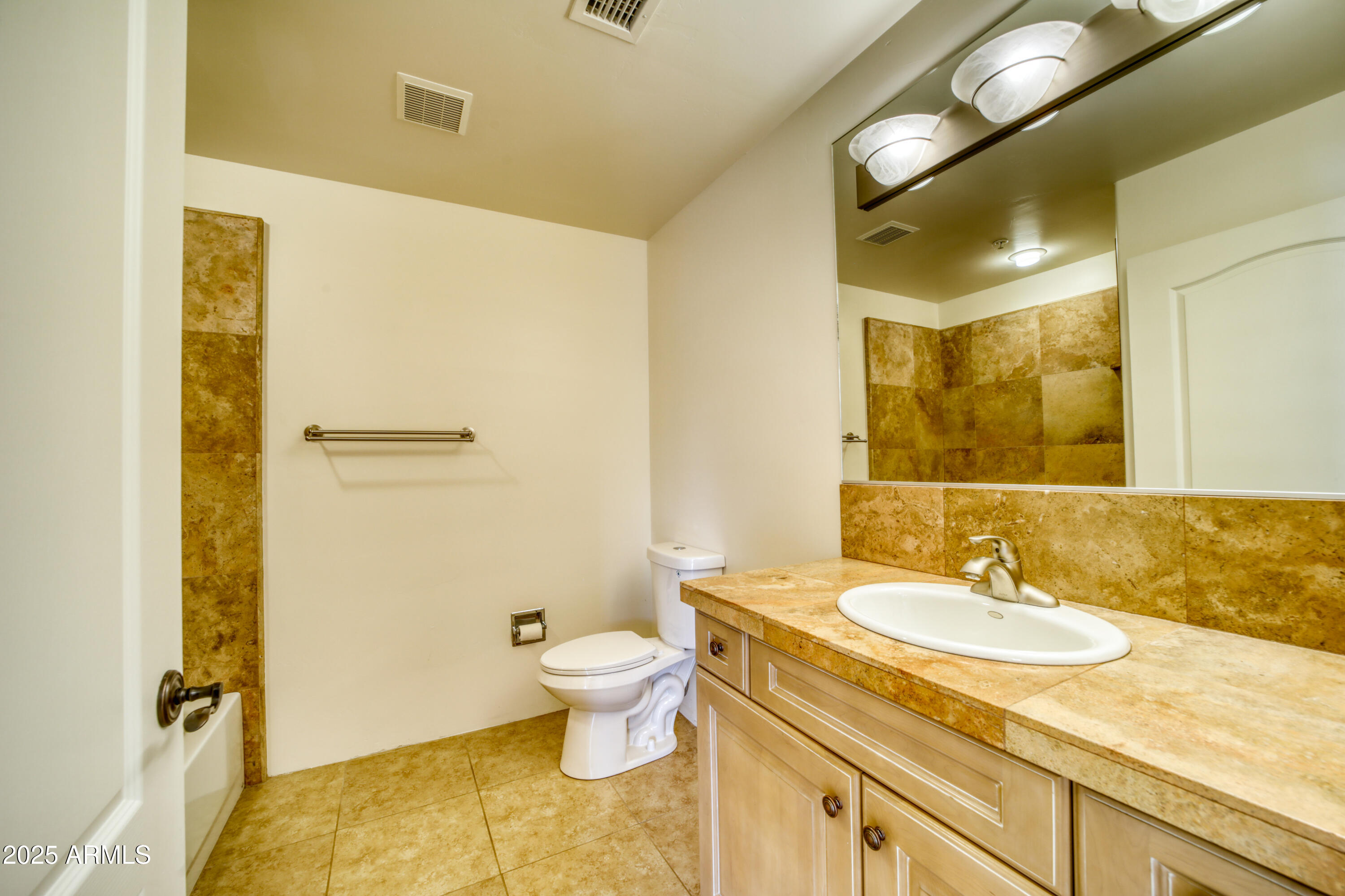 520 Jordan Road, Unit 4 Sedona, AZ 86336 - Photo 22 of 29 a bathroom with a granite countertop sink toilet and shower