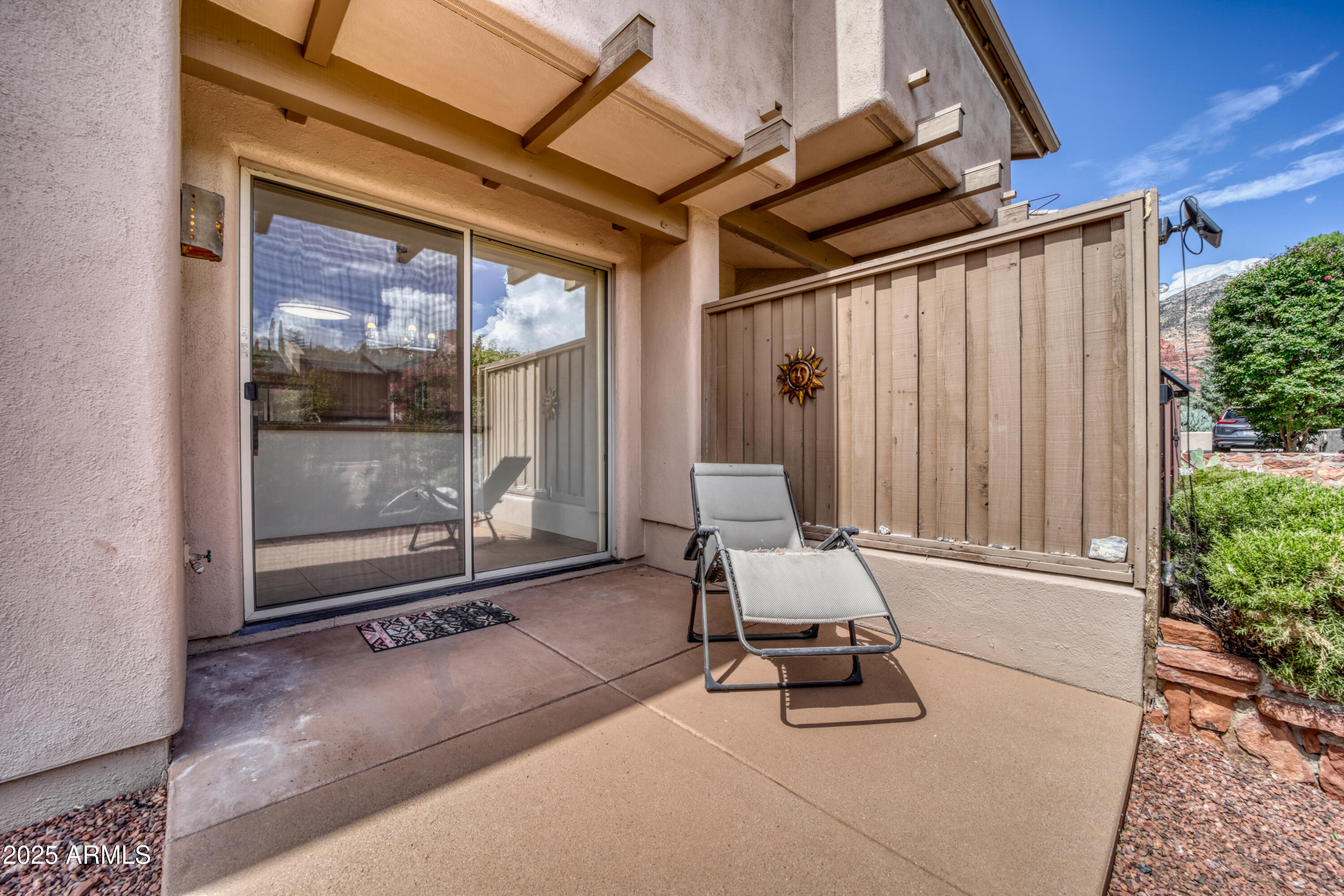 520 Jordan Road, Unit 4 Sedona, AZ 86336 - Photo 25 of 29 a view of a patio with table and chairs