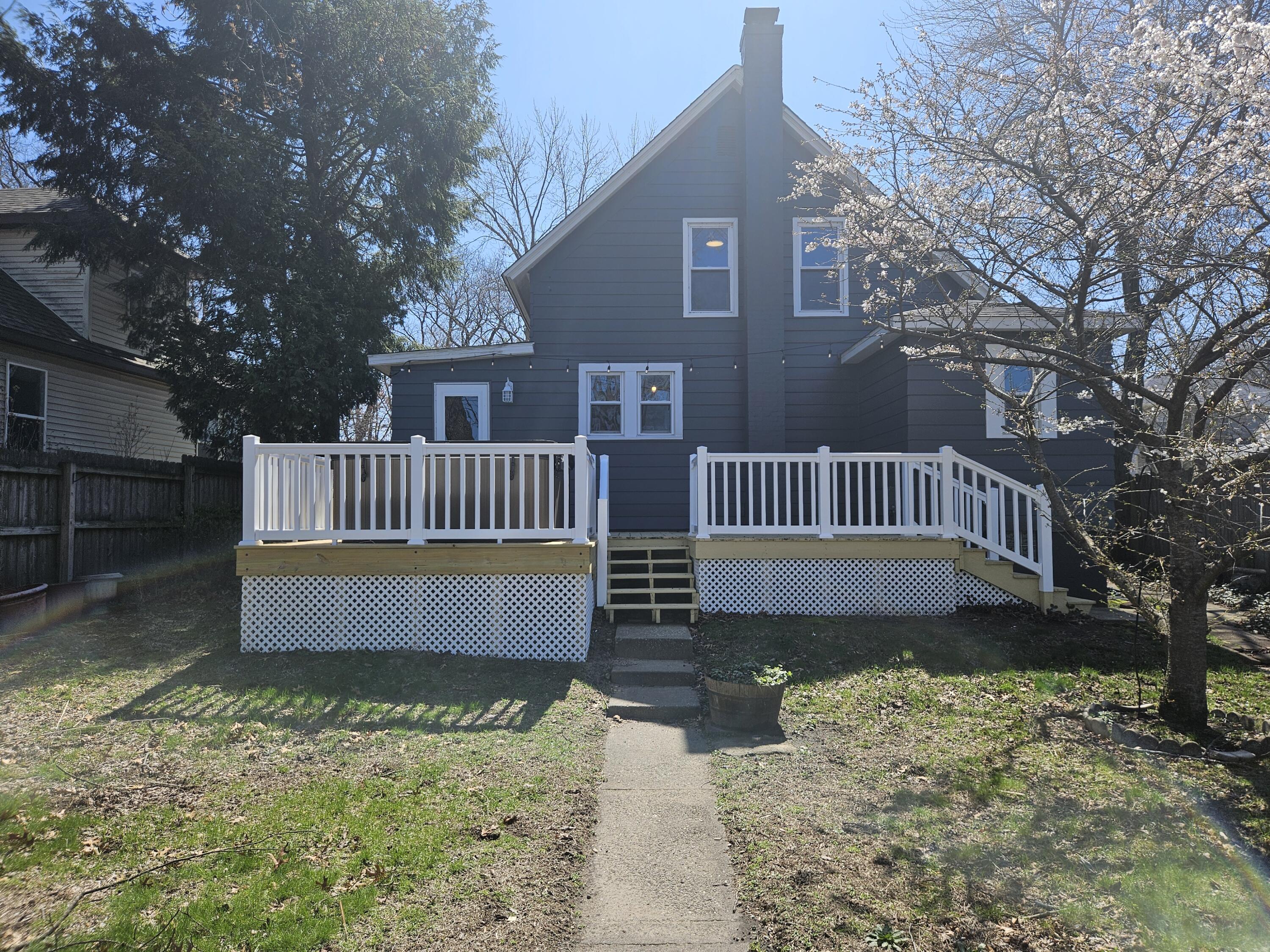 218 Fogarty Street Michigan City, IN 46360 - Photo 11 of 13 a view of a house with a yard