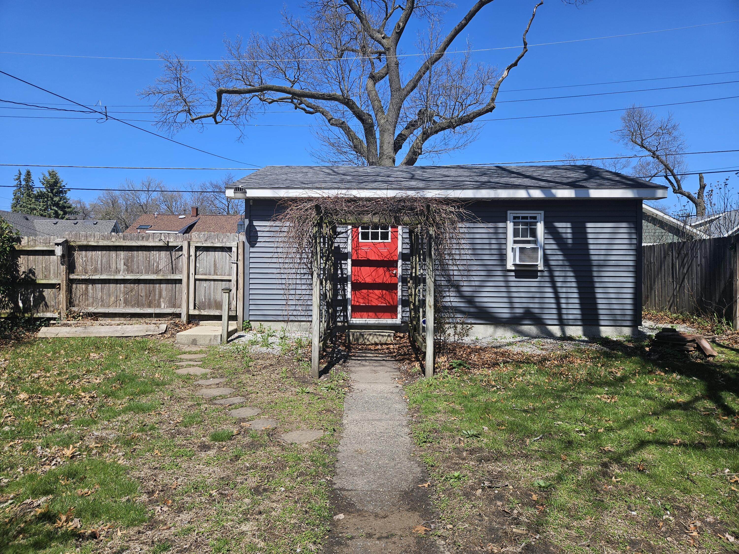 218 Fogarty Street Michigan City, IN 46360 - Photo 12 of 13 a view of a house with a yard
