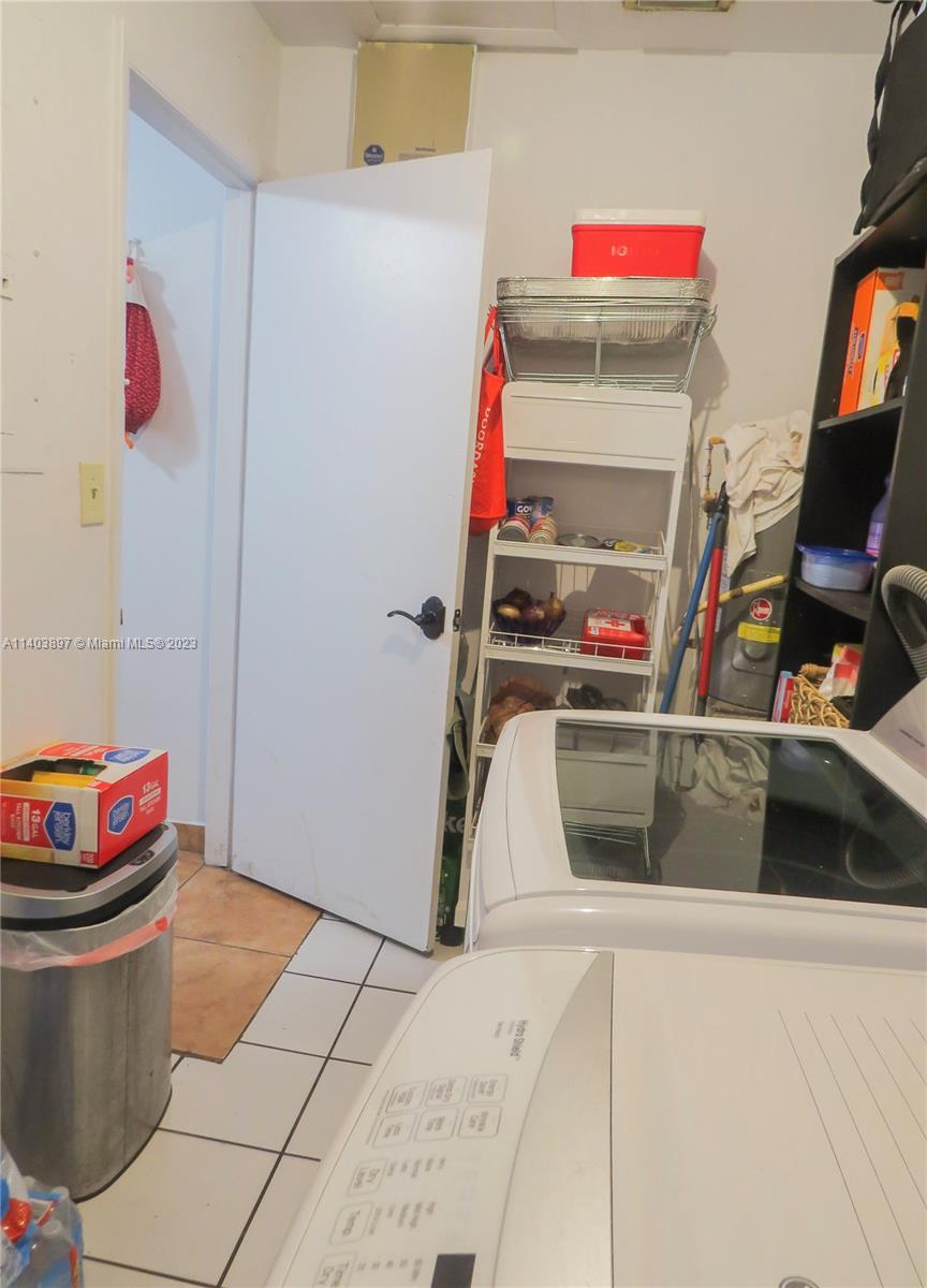 14225 Southwest 296th Street Homestead, FL 33033 - Photo 27 of 37 a utility room with dryer and washer