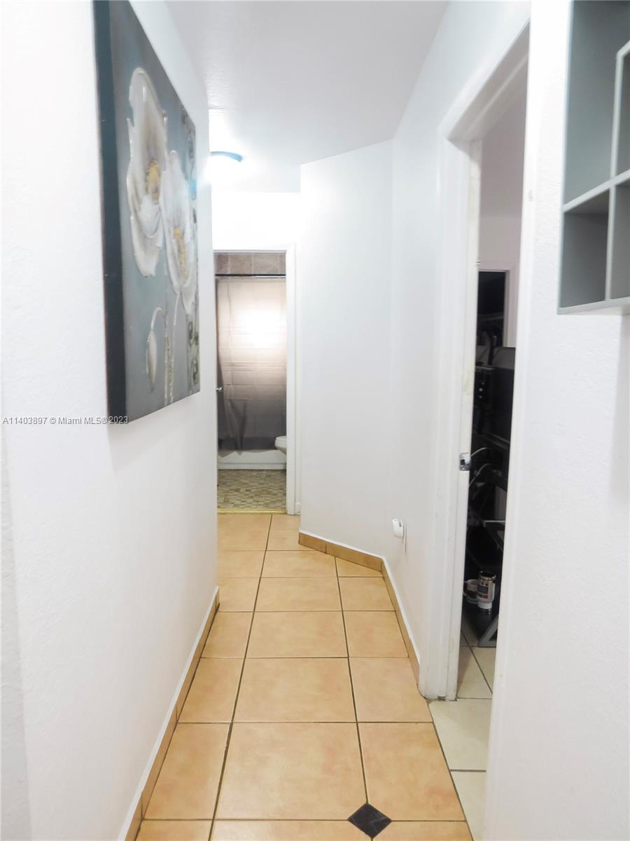 14225 Southwest 296th Street Homestead, FL 33033 - Photo 10 of 37 a view of a hallway