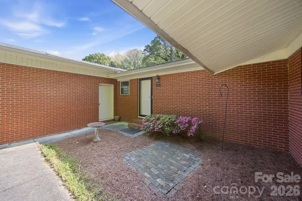 a view of a backyard with hardwood