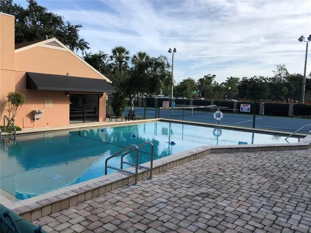 a view of a terrace with sitting area