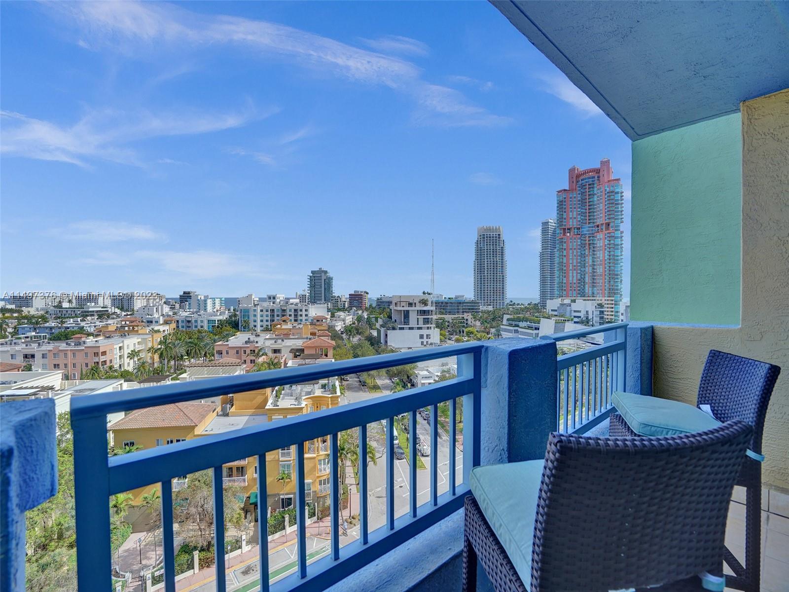 90 Alton Road, Unit 1109 Miami Beach, FL 33139 - Photo 16 of 23 a view of a chairs in balcony