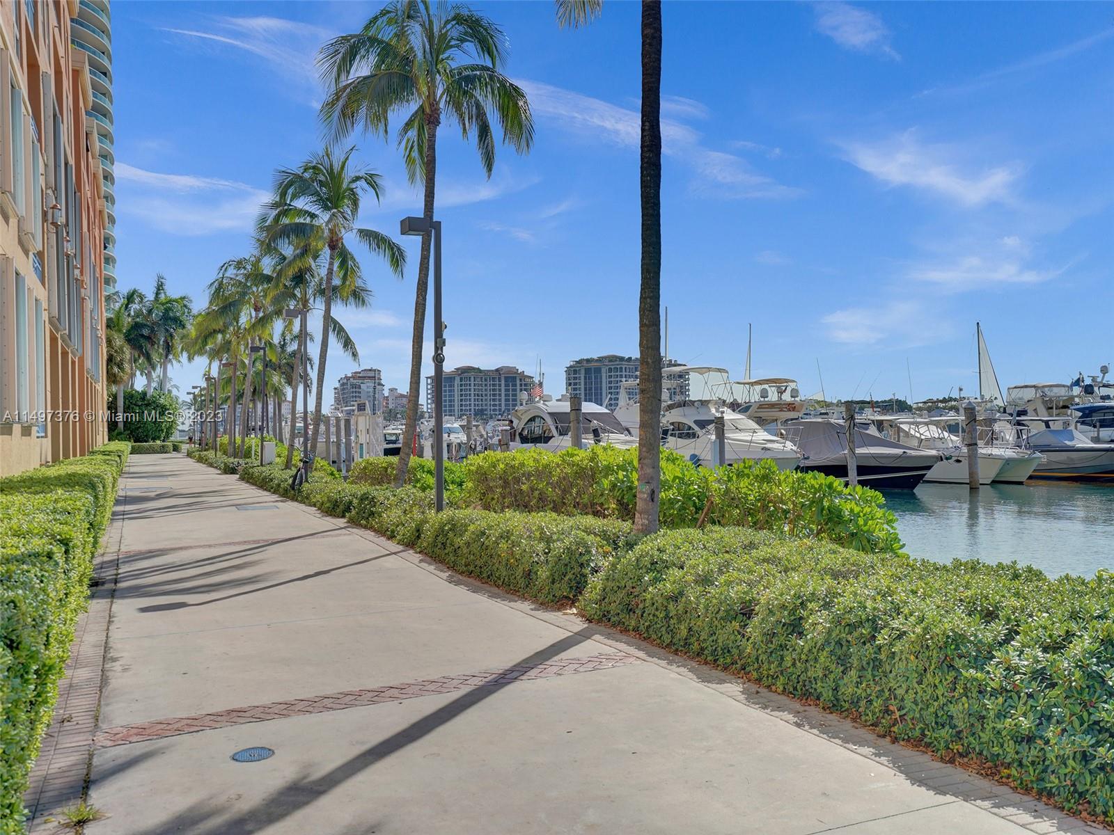 90 Alton Road, Unit 1109 Miami Beach, FL 33139 - Photo 21 of 23 a view of a garden with a lake view