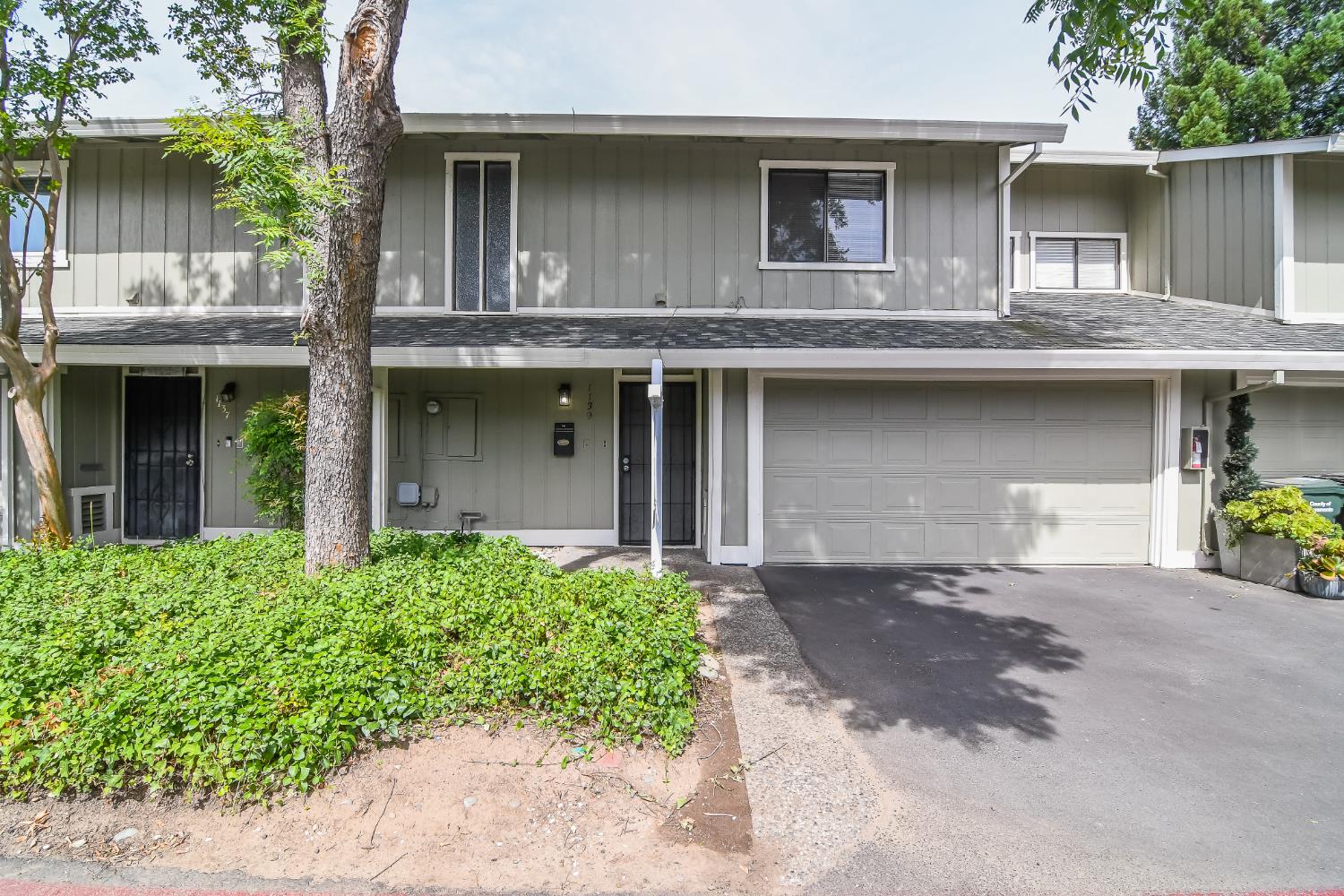 1139 Rivara Circle Sacramento, CA 95864 - Photo 2 of 72 a front view of a house with a garden
