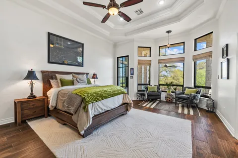 a bedroom with a bed and a fireplace