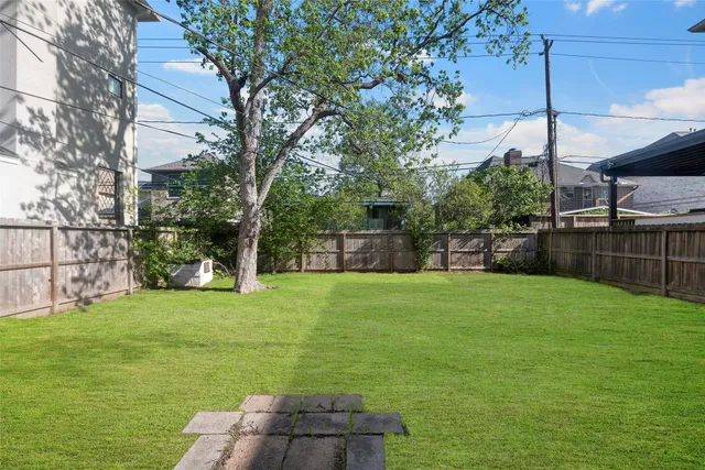 a view of a backyard with a garden