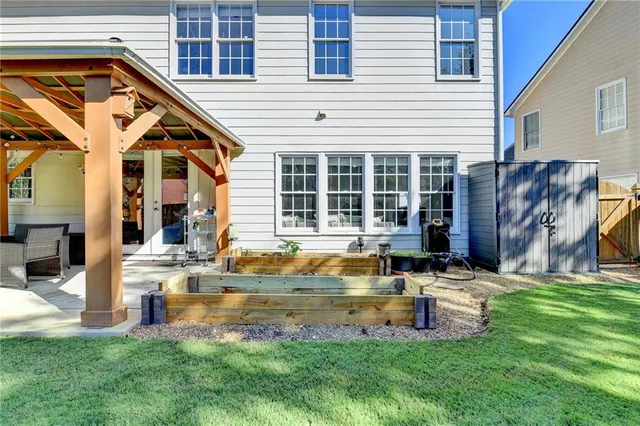 a view of a park with large trees