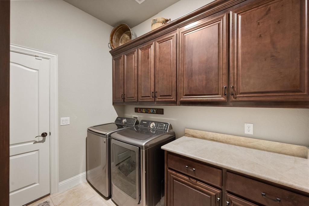 445 Rusty Run Drive Midlothian, TX 76065 - Photo 31 of 40 a utility room with dryer and washer