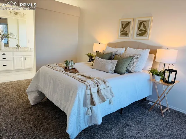 a vase of flowers sitting on a table