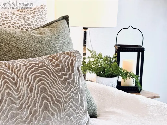 a bathroom with a granite countertop sink a mirror a vanity and bathtub