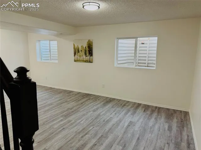 a view of a house with a snow in the yard