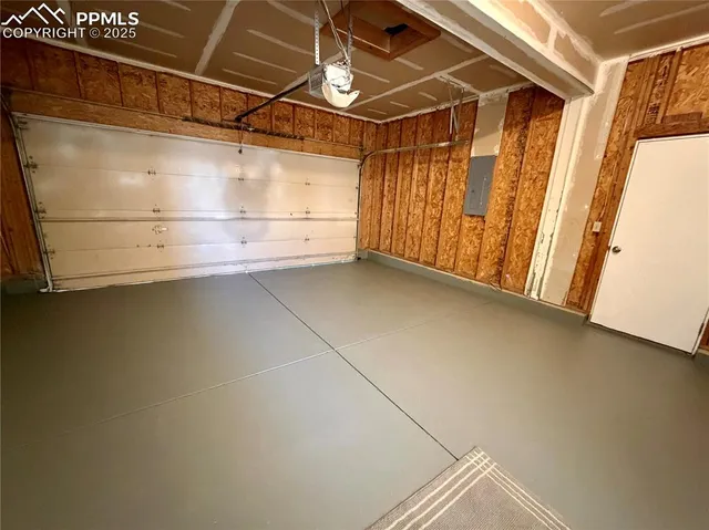 a table with a vase and flowers on it