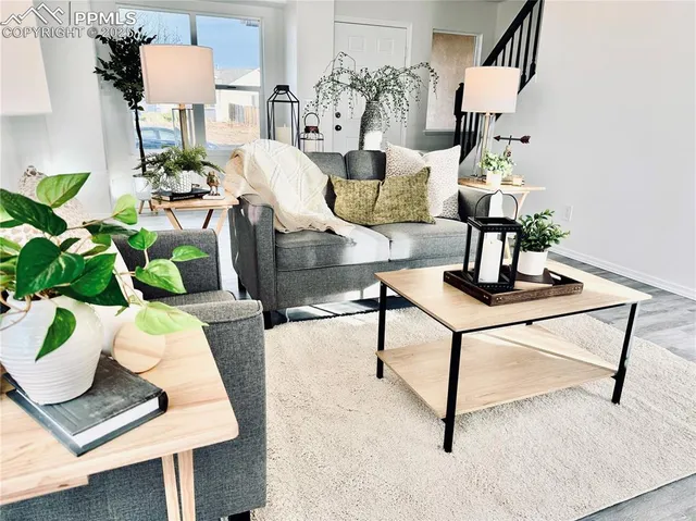 a view of a workspace with furniture