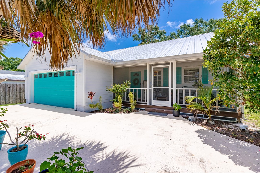 726 63rd Avenue Vero Beach, FL 32968 - Photo 1 of 22 a house with a outdoor space