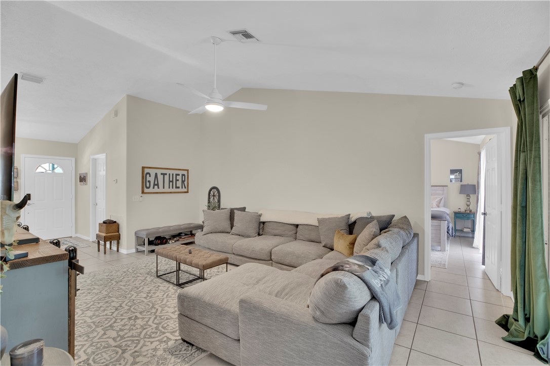 726 63rd Avenue Vero Beach, FL 32968 - Photo 11 of 22 a living room with furniture and a couch