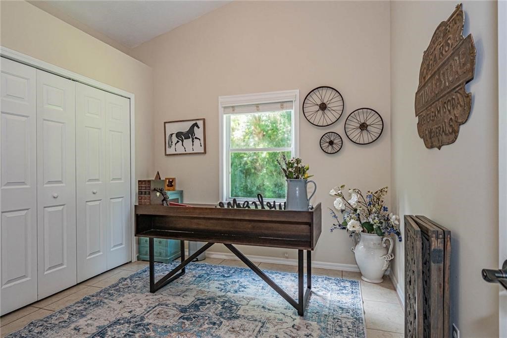 726 63rd Avenue Vero Beach, FL 32968 - Photo 17 of 22 a view of a workspace with furniture