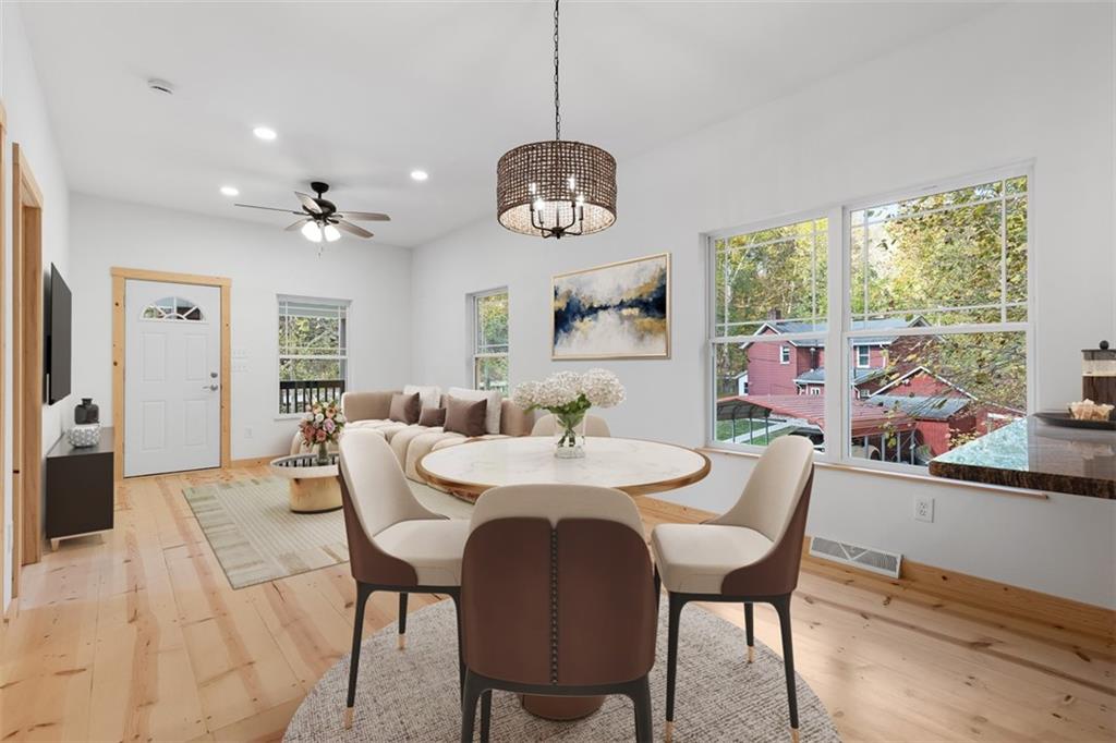 723 Glenfield Road Sewickley, PA 15143 - Photo 19 of 45 a view of a dining room with furniture window and outside view