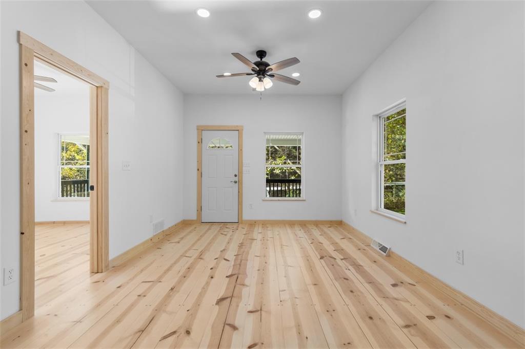 723 Glenfield Road Sewickley, PA 15143 - Photo 22 of 45 a view of empty room with wooden floor and fan