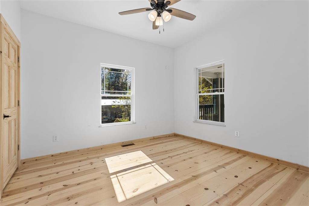 723 Glenfield Road Sewickley, PA 15143 - Photo 27 of 45 a view of a room with a window and ceiling fan